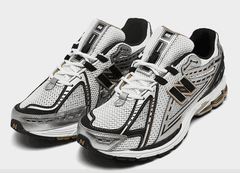 NEW BALANCE 1906RA Black White Gold at Gravity NYC