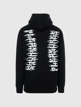 PLEASURES Ripped Hoodie at Gravity NYC