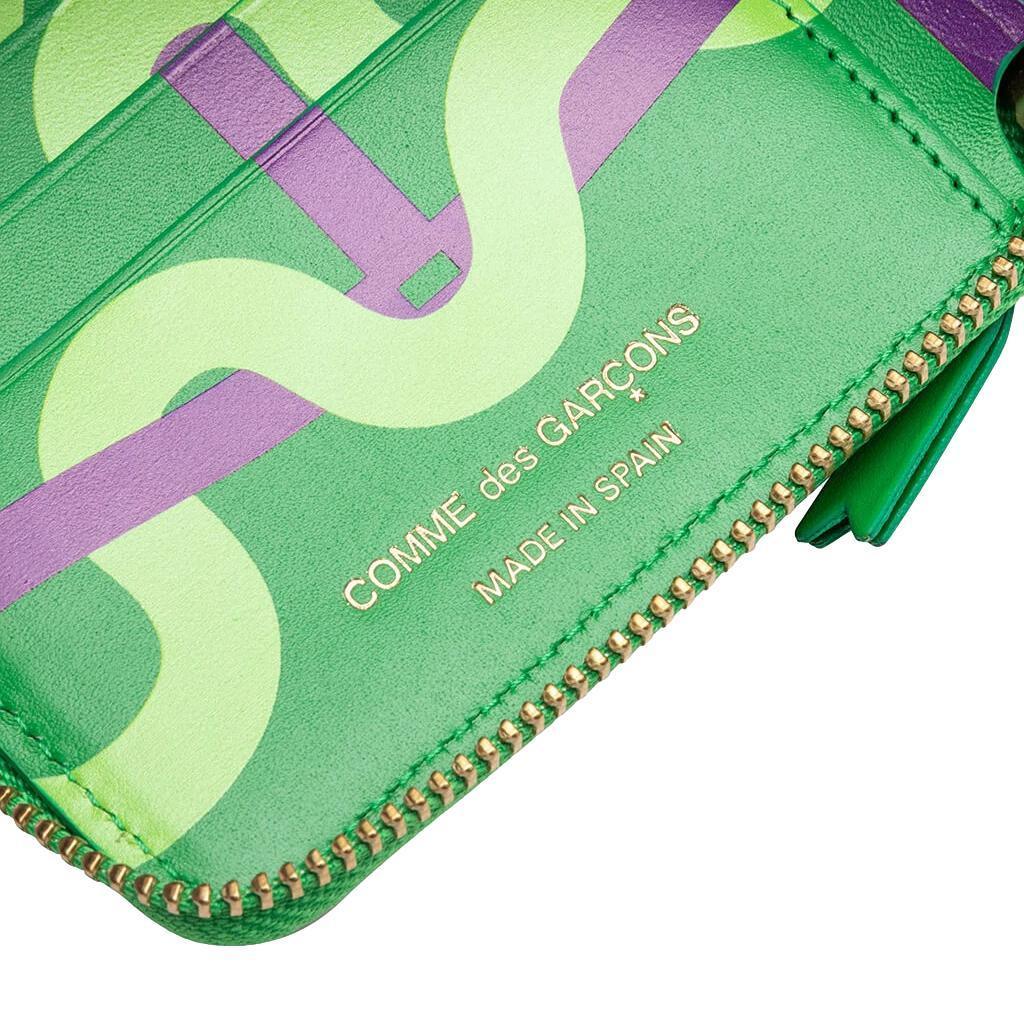 COMME DES GARCONS Ruby Eyes Wallet - Gravity NYC