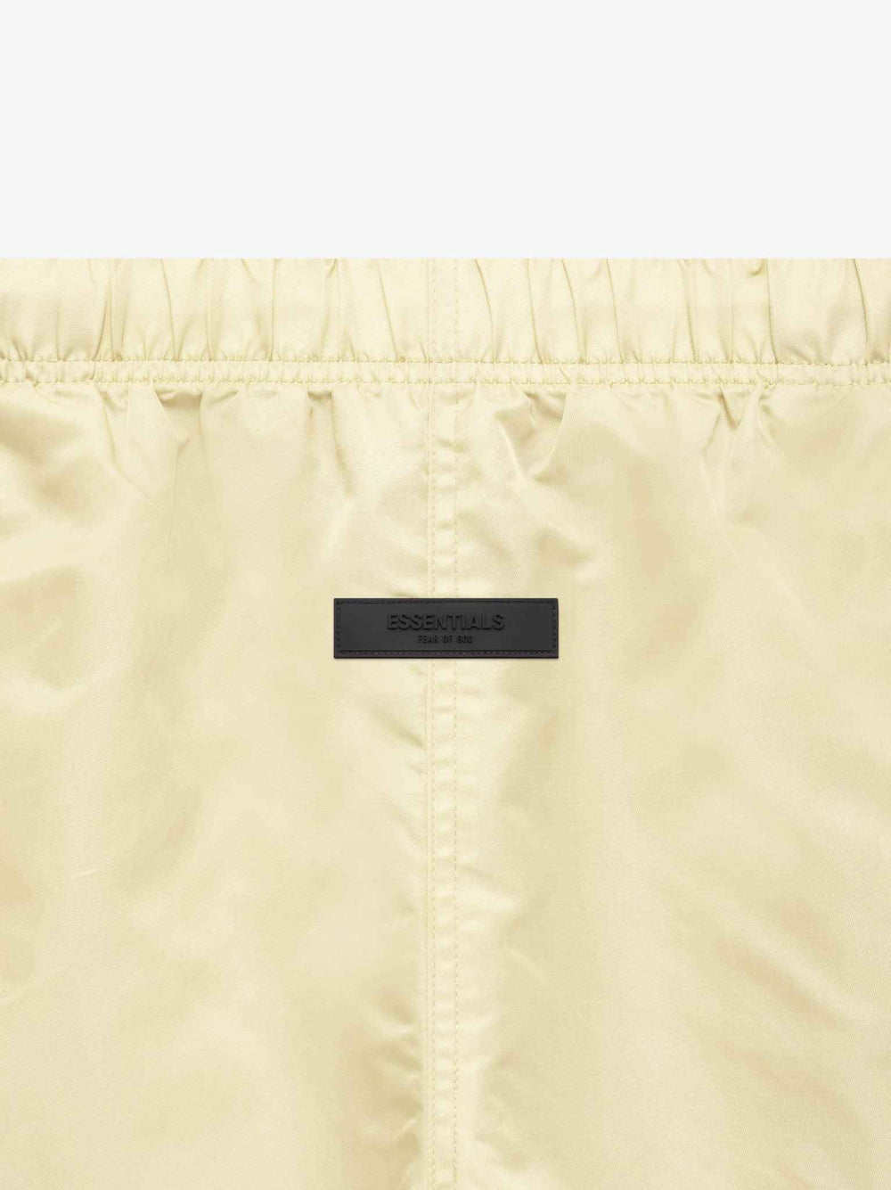 FEAR OF GOD Essentials Nylon Running Shorts Canary - Gravity NYC